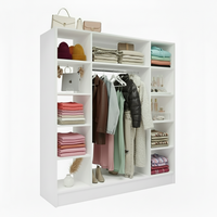 Internal layout of a modern white 4-door wardrobe cupboard with hanging rail and shelving storage